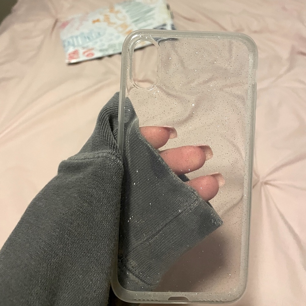 Clear iPhone XS phone case with glitter